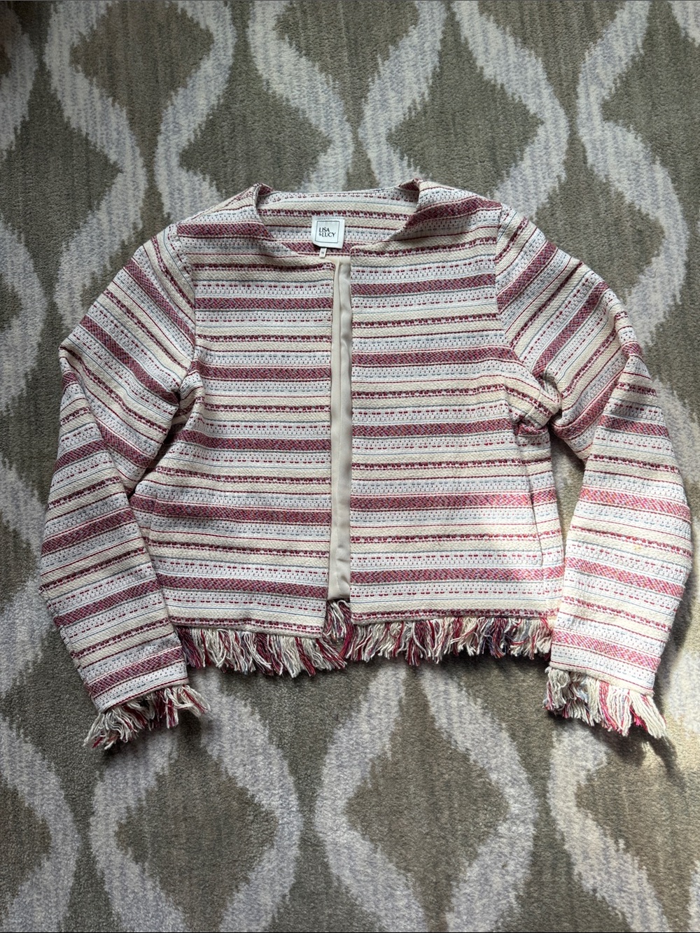 Lisa & Lucy Crop blazer with fringe detail. Heavy tapestry type fabric lined.